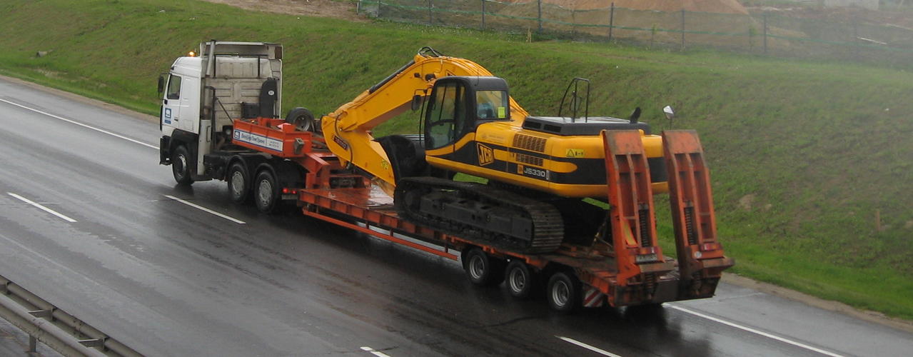 Перевозка экскаватора тралом